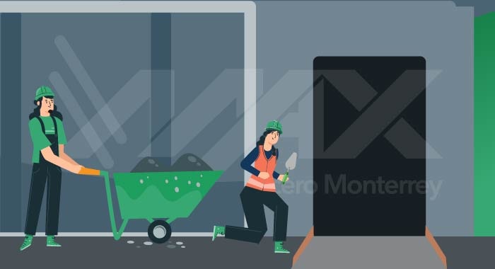 Elaboración de un pasillo de concreto en el exterior de una casa en construcción