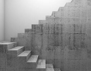 Escalera de concreto con descanso y vuelta