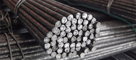 Barras de acero A-36 apiladas